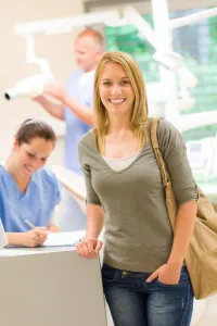 woman at reception desk